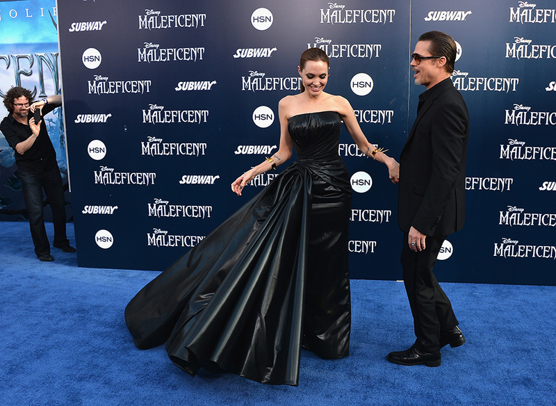 Illustration for article titled Angelina Jolie Accessorizes Like a Disney Villain